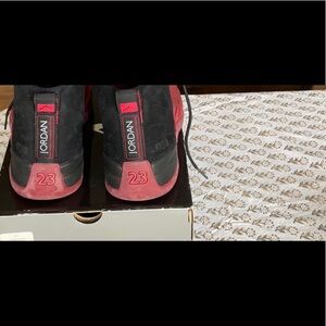 Air Jordan 12 Retro black/varsity red size 11, gently used.